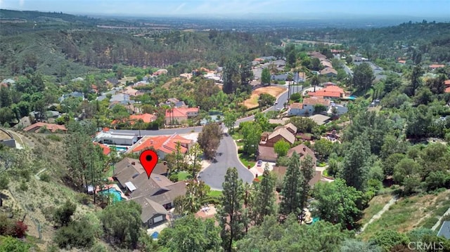 1821 Overview Cir, North Tustin, CA 92705 - aerial overview of property's location featuring nearby suburban area and a forest