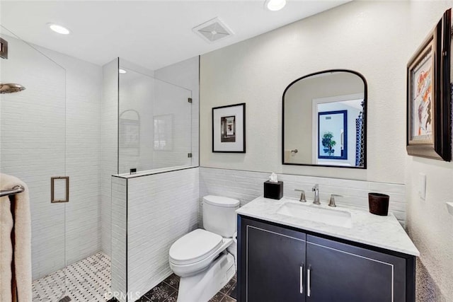 1821 Overview Cir, North Tustin, CA 92705 - bathroom with vanity, toilet, a walk in shower, tile walls, and tile patterned flooring