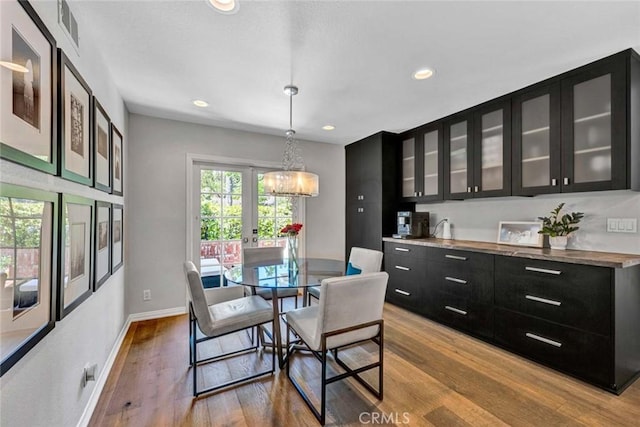 1821 Overview Cir, North Tustin, CA 92705 - dining area featuring wood finished floors, baseboards, and recessed lighting