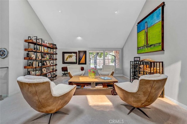 1821 Overview Cir, North Tustin, CA 92705 - living area featuring lofted ceiling, baseboards, and carpet
