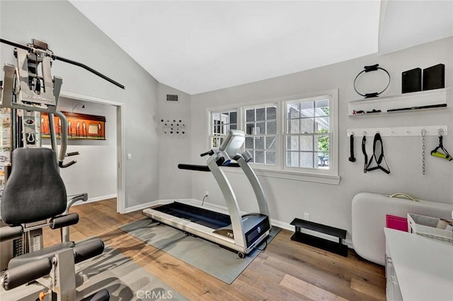 1821 Overview Cir, North Tustin, CA 92705 - workout room with vaulted ceiling, wood finished floors, and baseboards