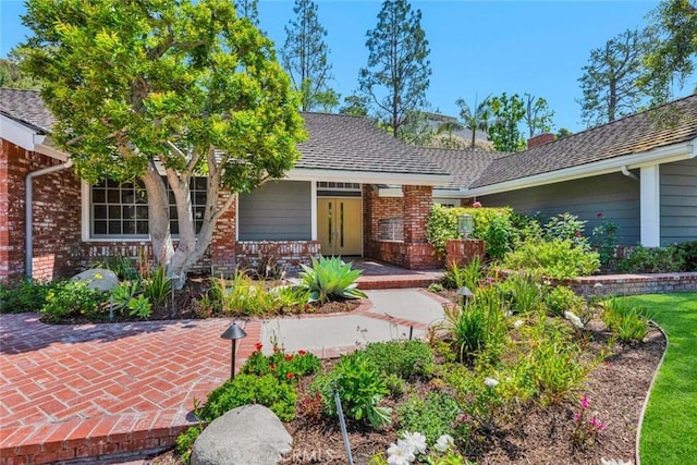 1821 Overview Cir, North Tustin, CA 92705 - view of front of home with brick siding and a porch