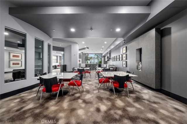 400 W Ocean Blvd Unit 605, Long Beach, CA 90802 - dining room featuring recessed lighting, built in features, baseboards, and concrete floors