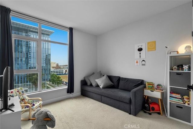 400 W Ocean Blvd Unit 605, Long Beach, CA 90802 - living area featuring carpet floors and plenty of natural light