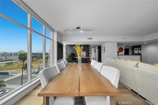 400 W Ocean Blvd Unit 605, Long Beach, CA 90802 - dining area with light wood finished floors and healthy amount of natural light
