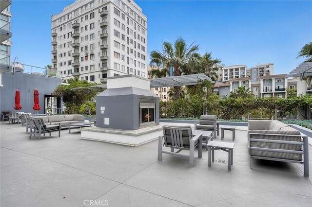400 W Ocean Blvd Unit 605, Long Beach, CA 90802 - view of patio / terrace featuring an outdoor living space with a fireplace
