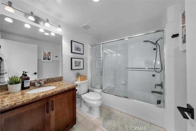 400 W Ocean Blvd Unit 605, Long Beach, CA 90802 - bathroom featuring vanity, toilet, bath / shower combo with glass door, and tile patterned floors