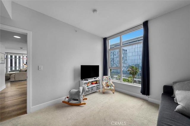 400 W Ocean Blvd Unit 605, Long Beach, CA 90802 - carpeted living area featuring baseboards