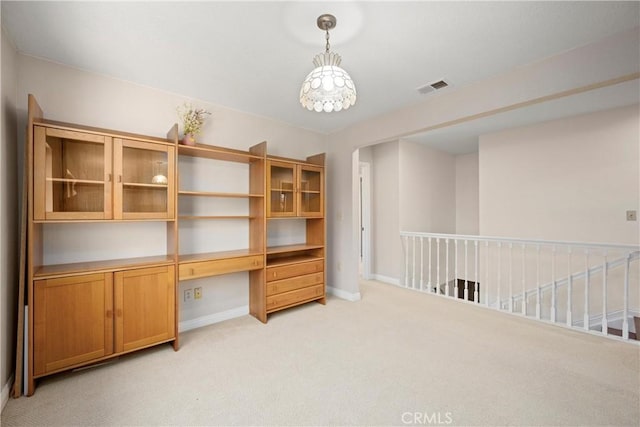 10139 Sun Valley Dr, Rancho Cucamonga, CA 91737 - unfurnished office with built in study area, light carpet, and baseboards