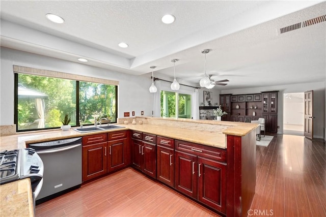 10139 Sun Valley Dr, Rancho Cucamonga, CA 91737 - kitchen with dishwasher, a sink, dark brown cabinets, range with gas cooktop, and a ceiling fan