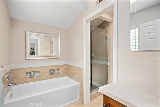 10139 Sun Valley Dr, Rancho Cucamonga, CA 91737 - full bathroom with vanity, a bath, a shower stall, and lofted ceiling