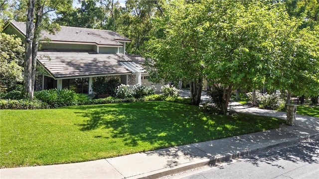 10139 Sun Valley Dr, Rancho Cucamonga, CA 91737 - obstructed view of property featuring a front yard and a tile roof