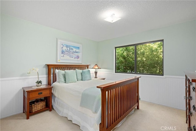 10139 Sun Valley Dr, Rancho Cucamonga, CA 91737 - carpeted bedroom with wainscoting and a textured ceiling