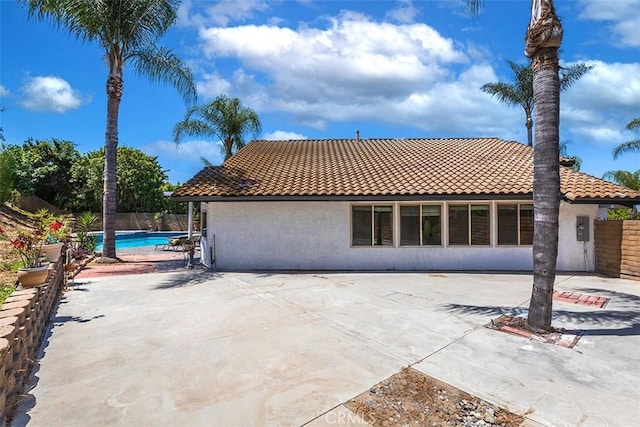 1250 Kinglake Dr, Diamond Bar, CA 91789 - rear view of property featuring stucco siding, a tile roof, and a patio area