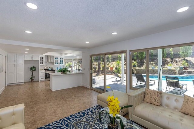 1250 Kinglake Dr, Diamond Bar, CA 91789 - living area featuring recessed lighting, a textured ceiling, and light tile patterned floors