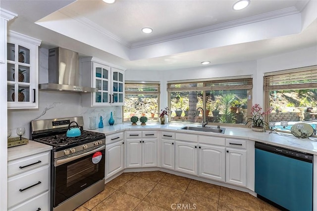 1250 Kinglake Dr, Diamond Bar, CA 91789 - kitchen featuring dishwasher, stainless steel gas range oven, wall chimney exhaust hood, a raised ceiling, and healthy amount of natural light