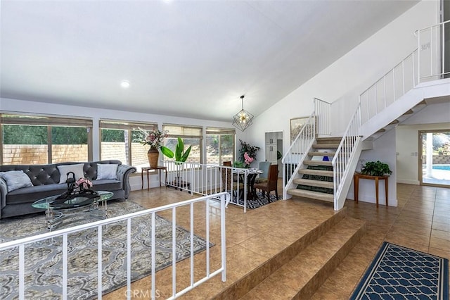 1250 Kinglake Dr, Diamond Bar, CA 91789 - living area featuring stairway, lofted ceiling, tile patterned flooring, a chandelier, and recessed lighting