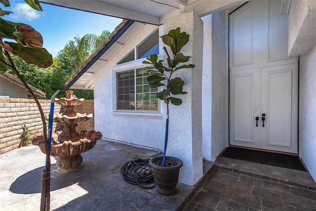 1250 Kinglake Dr, Diamond Bar, CA 91789 - doorway to property featuring a patio area and stucco siding