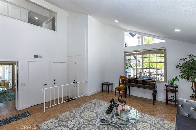 1250 Kinglake Dr, Diamond Bar, CA 91789 - sitting room with tile patterned flooring, high vaulted ceiling, a textured ceiling, and recessed lighting