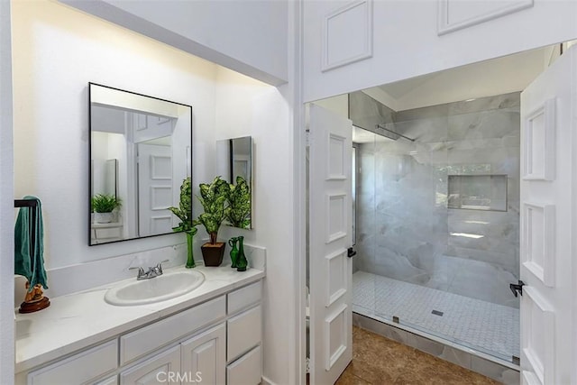 1250 Kinglake Dr, Diamond Bar, CA 91789 - bathroom featuring a tile shower, vanity, and tile patterned flooring