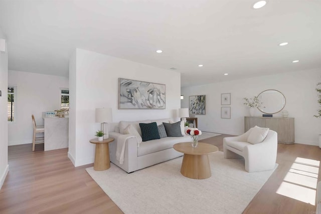 6871 Mewall Dr, San Diego, CA 92119 - living room with light wood finished floors, recessed lighting, and baseboards