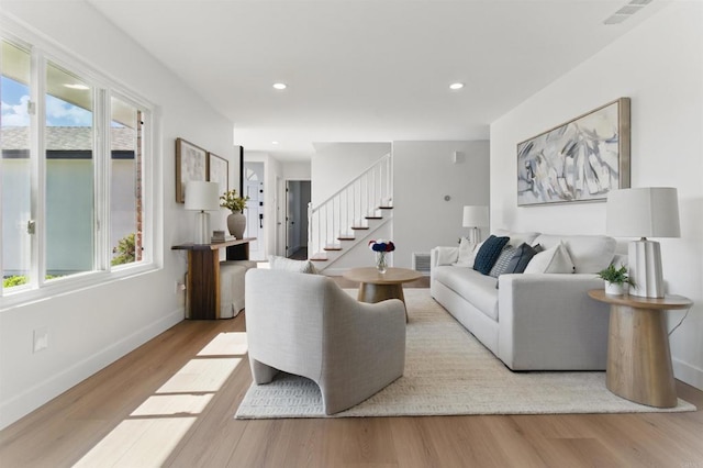 6871 Mewall Dr, San Diego, CA 92119 - living area with plenty of natural light, stairway, wood finished floors, baseboards, and recessed lighting