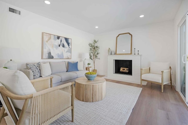 6871 Mewall Dr, San Diego, CA 92119 - living area with wood finished floors, recessed lighting, a fireplace, and baseboards