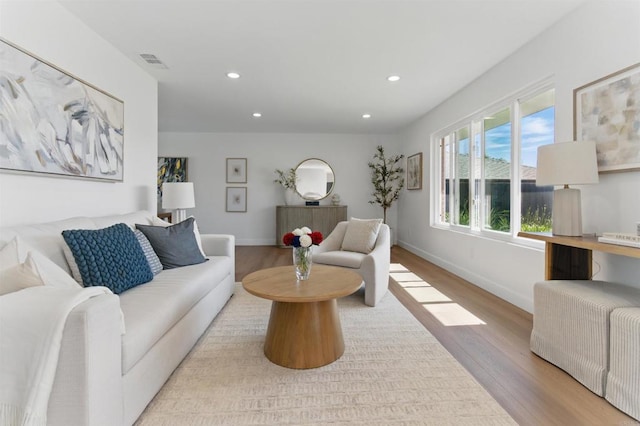 6871 Mewall Dr, San Diego, CA 92119 - living area featuring wood finished floors, recessed lighting, and baseboards