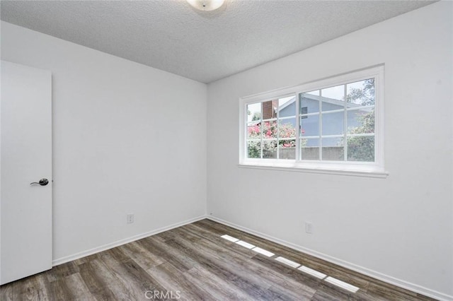 1919 Austin Ct, Claremont, CA 91711 - empty room featuring wood finished floors, a textured ceiling, and baseboards