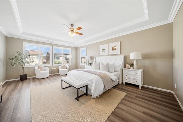 7626 Soaring Bird Ct, Eastvale, CA 92880 - bedroom with a raised ceiling, dark wood-type flooring, baseboards, ornamental molding, and a ceiling fan