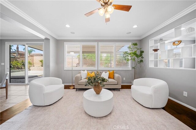 7626 Soaring Bird Ct, Eastvale, CA 92880 - living room with baseboards, wood finished floors, ceiling fan, crown molding, and recessed lighting