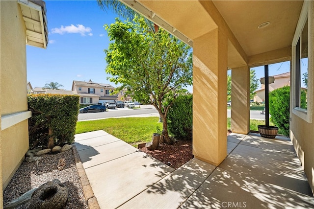 7626 Soaring Bird Ct, Eastvale, CA 92880 - view of patio / terrace featuring a residential view