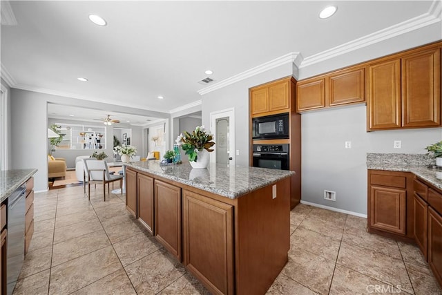 7626 Soaring Bird Ct, Eastvale, CA 92880 - kitchen featuring black appliances, brown cabinetry, recessed lighting, ornamental molding, and a center island