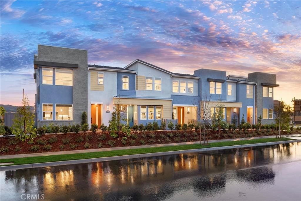 126 Hazel Dr, Rancho Mission Viejo, CA 92694 - view of front of home featuring stucco siding and a water view