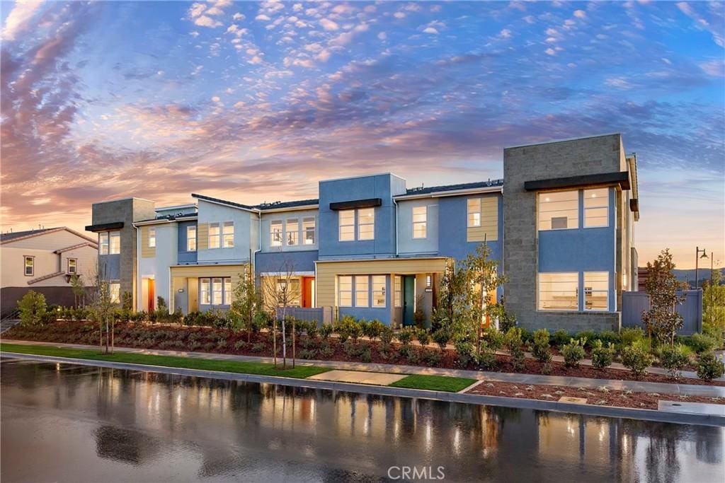 126 Hazel Dr, Rancho Mission Viejo, CA 92694 - view of front of house with stucco siding and a water view
