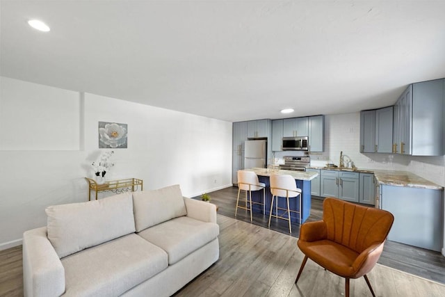2548 Katherine Ct, El Cajon, CA 92020 - living room featuring baseboards, dark wood-style floors, and recessed lighting
