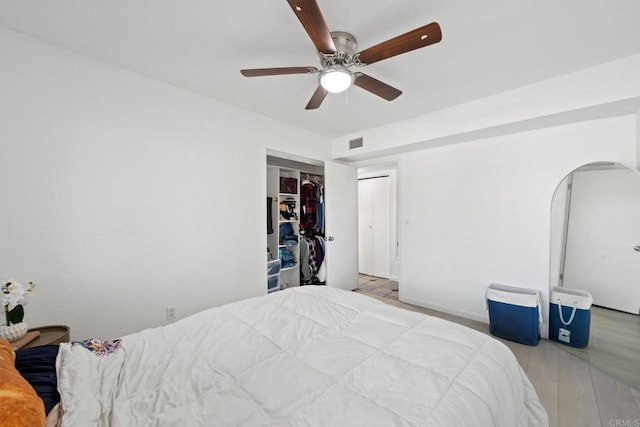 2548 Katherine Ct, El Cajon, CA 92020 - bedroom featuring arched walkways, a ceiling fan, and a closet
