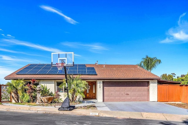 2548 Katherine Ct, El Cajon, CA 92020 - single story home featuring a garage, solar panels, driveway, stucco siding, and roof with shingles