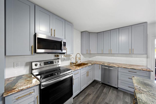 2548 Katherine Ct, El Cajon, CA 92020 - kitchen featuring stainless steel appliances, a sink, gray cabinetry, dark wood finished floors, and light stone counters
