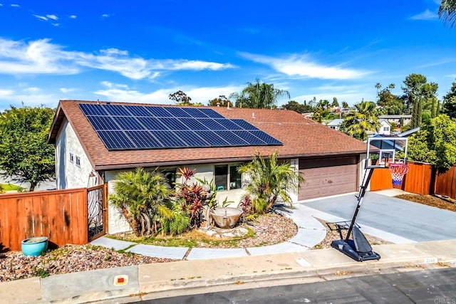 2548 Katherine Ct, El Cajon, CA 92020 - single story home with roof with shingles, a garage, driveway, and roof mounted solar panels