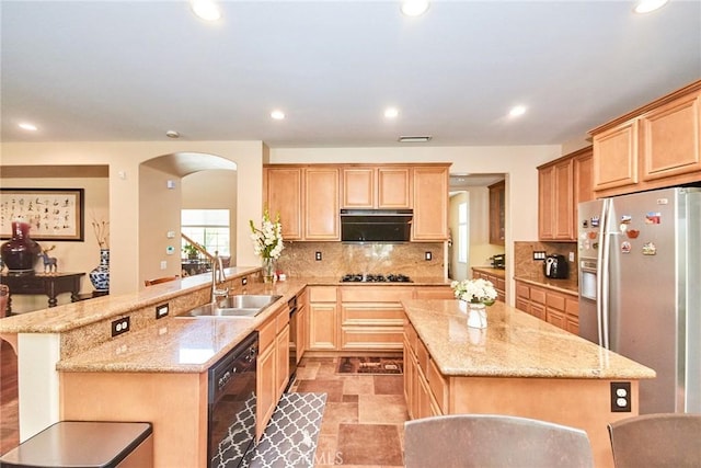 12430 Split Rein Dr, Rancho Cucamonga, CA 91739 - kitchen with a sink, black appliances, arched walkways, light brown cabinets, and a peninsula