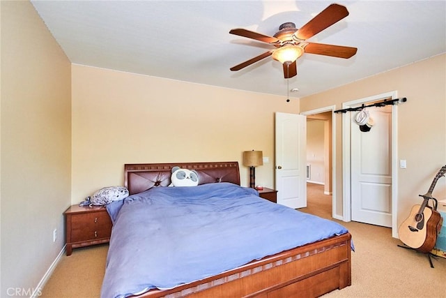 12430 Split Rein Dr, Rancho Cucamonga, CA 91739 - bedroom featuring light colored carpet, baseboards, and a ceiling fan