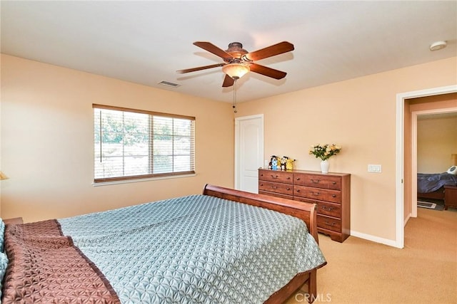 12430 Split Rein Dr, Rancho Cucamonga, CA 91739 - bedroom featuring light carpet, a ceiling fan, and baseboards