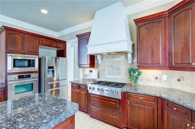 2096 E Olympic Ave, Fresno, CA 93730 - kitchen with appliances with stainless steel finishes, premium range hood, dark stone countertops, ornamental molding, and tasteful backsplash