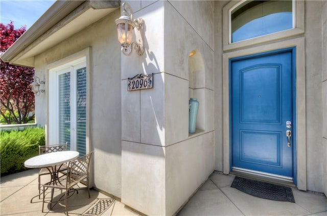 2096 E Olympic Ave, Fresno, CA 93730 - view of exterior entry with stucco siding