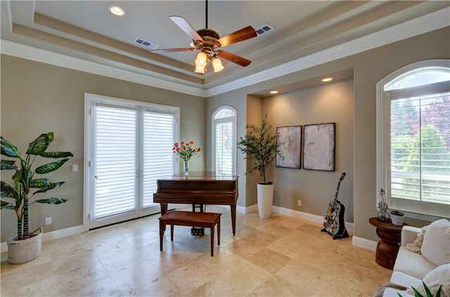 2096 E Olympic Ave, Fresno, CA 93730 - living area featuring a tray ceiling, ceiling fan, crown molding, baseboards, and recessed lighting