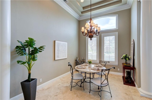 2096 E Olympic Ave, Fresno, CA 93730 - dining area featuring a raised ceiling, a chandelier, crown molding, and baseboards