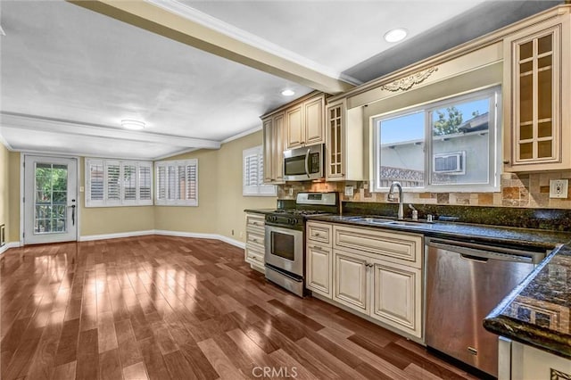 3163 La Clede Ave, Los Angeles, CA 90039 - kitchen featuring appliances with stainless steel finishes, cream cabinetry, a sink, baseboards, and crown molding