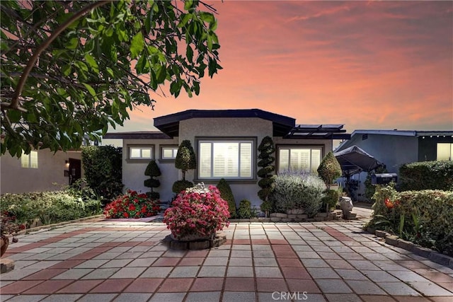 3163 La Clede Ave, Los Angeles, CA 90039 - rear view of house with stucco siding and a patio