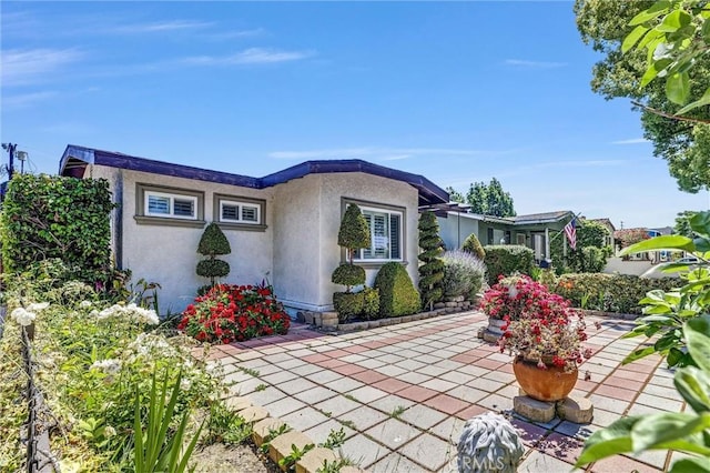 3163 La Clede Ave, Los Angeles, CA 90039 - ranch-style home with stucco siding and a patio area